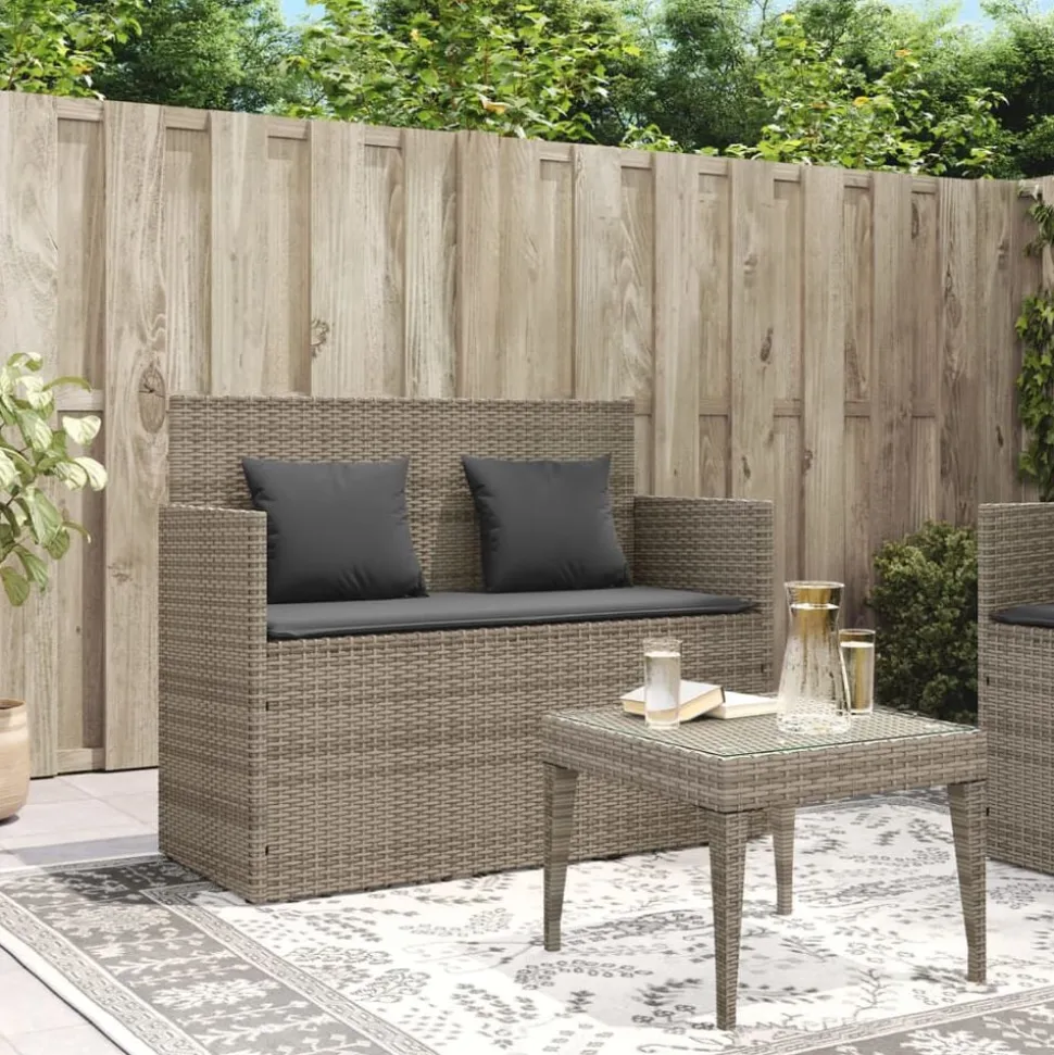 vidaXL Tuinbank met kussens poly rattan grijs